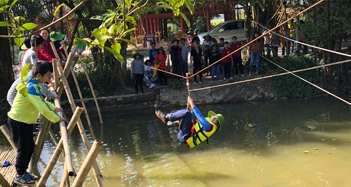 Nui Ngam eco-tourism area - participating in rope swing
