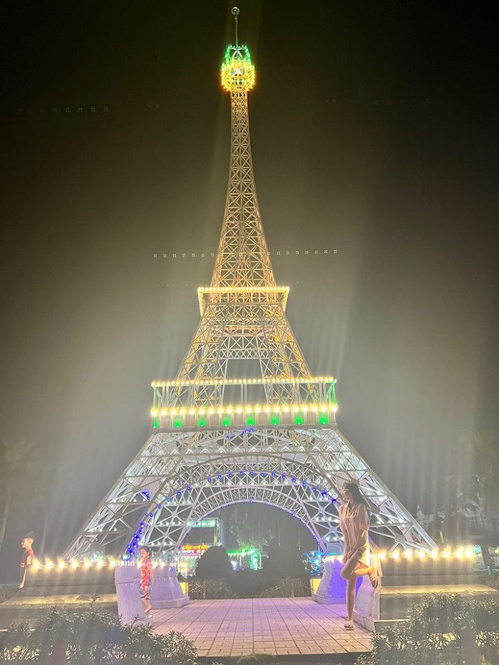 The Vietnamese version of the Eiffel Tower in the 7 wonders park at night
