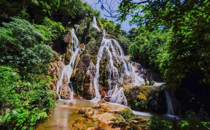 Pung Mai Chau Waterfall is located among the green forests