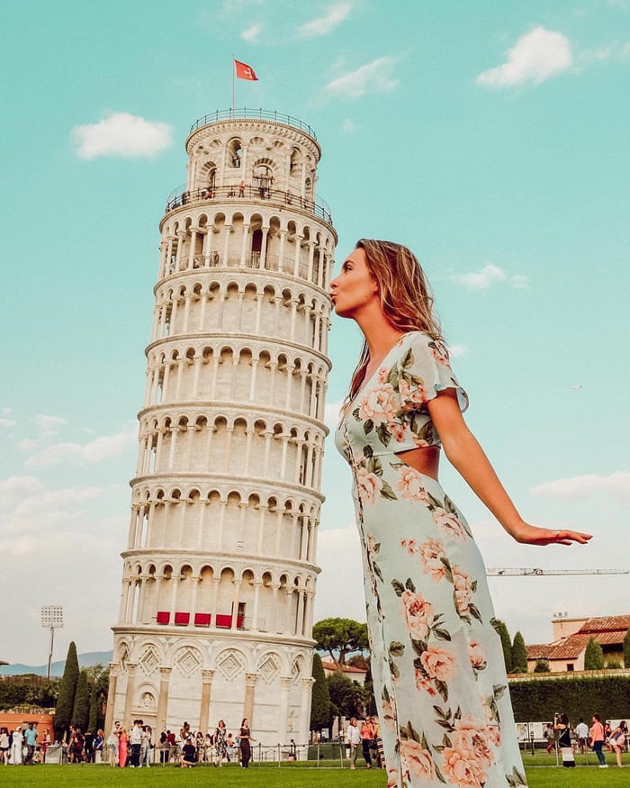 Admire the Leaning Tower of Pisa - a famous tourist destination
