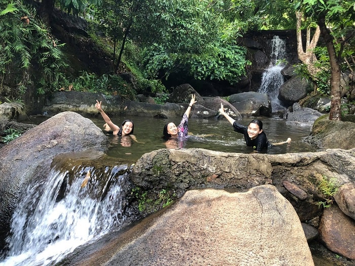 Bathing in the stream in Suoi Hoa eco-tourism area